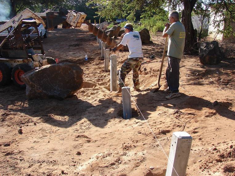 Setting a line of fence posts
